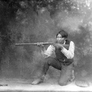 First Nations man with gun