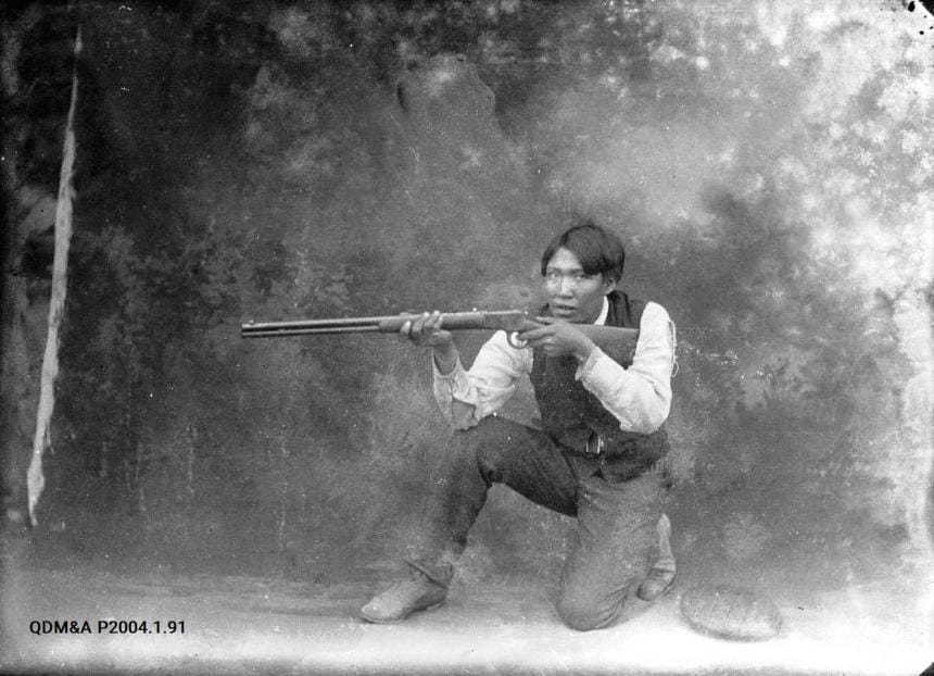 First Nations man with gun